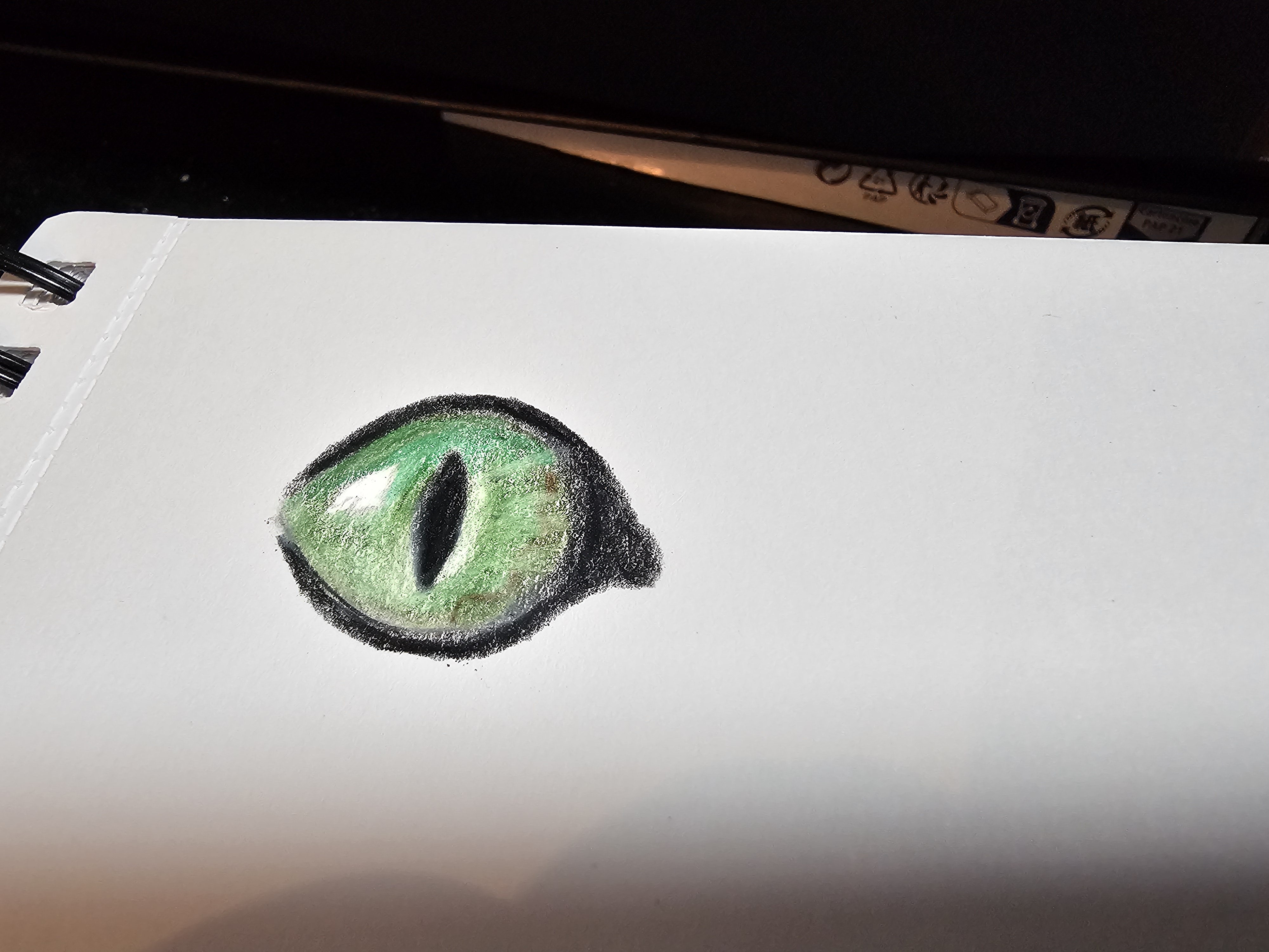 eye drawn with colored pencil